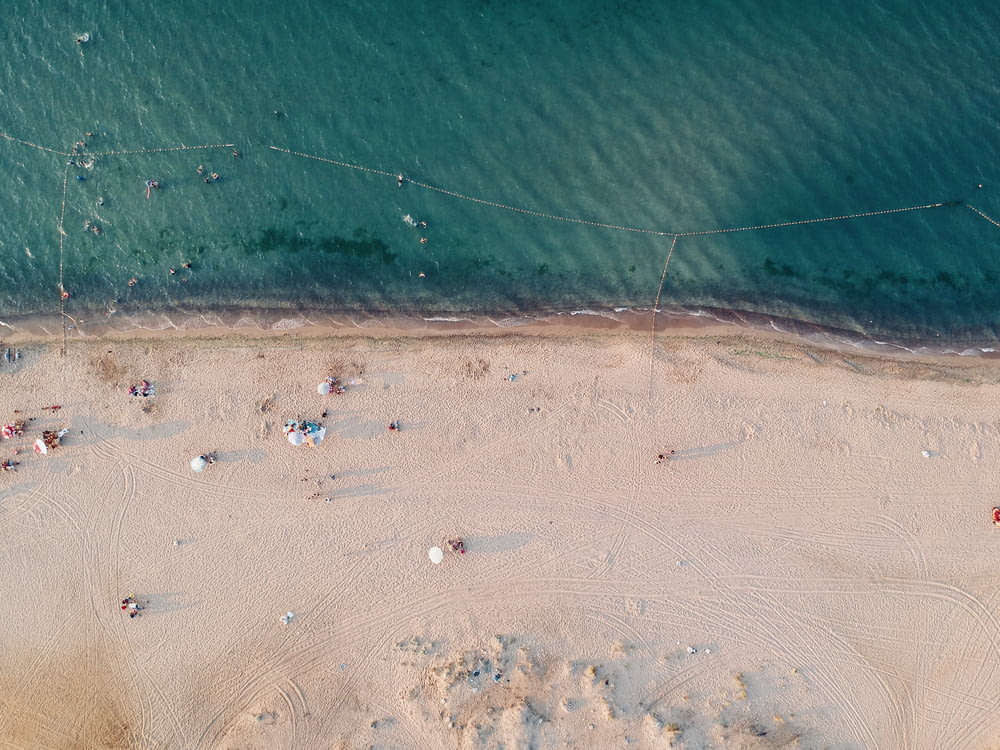 aerial photography of sand and sea