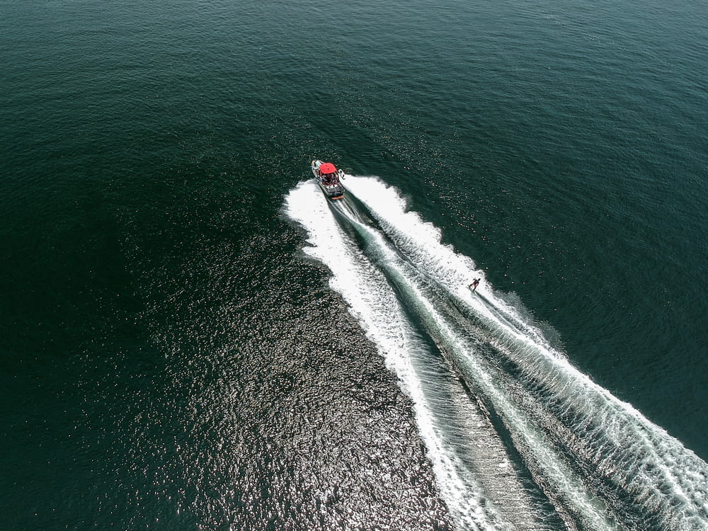 aerial photography of speedboat on body of water