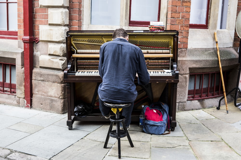 man performing piano