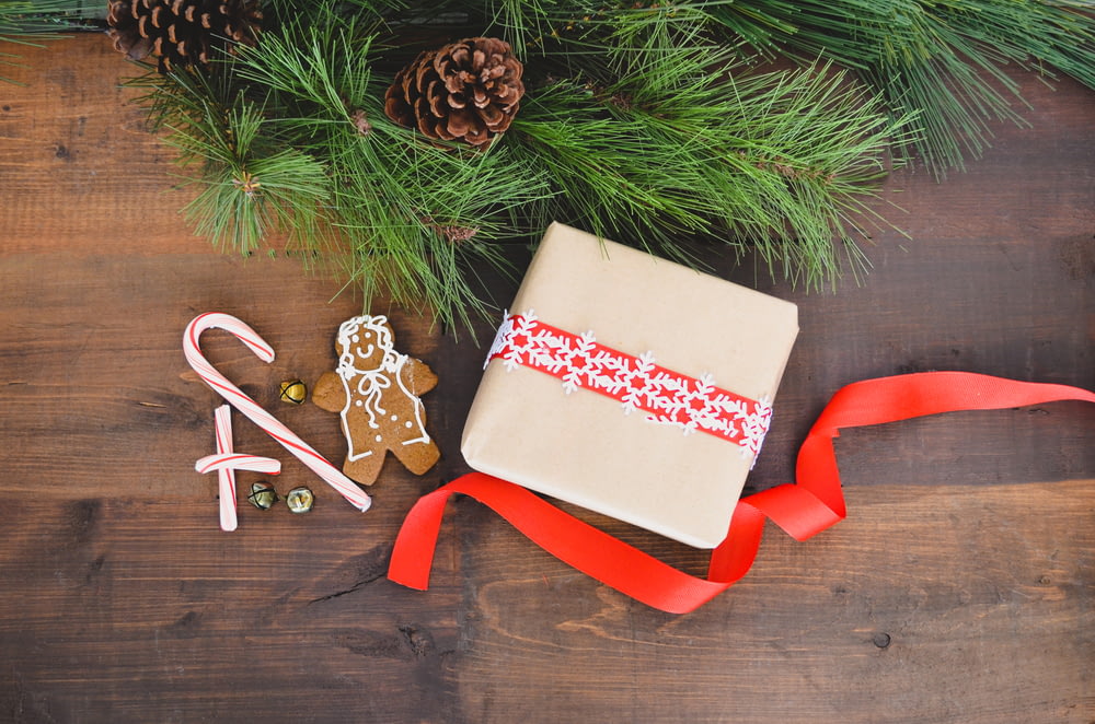 white gift box beside gingerbread