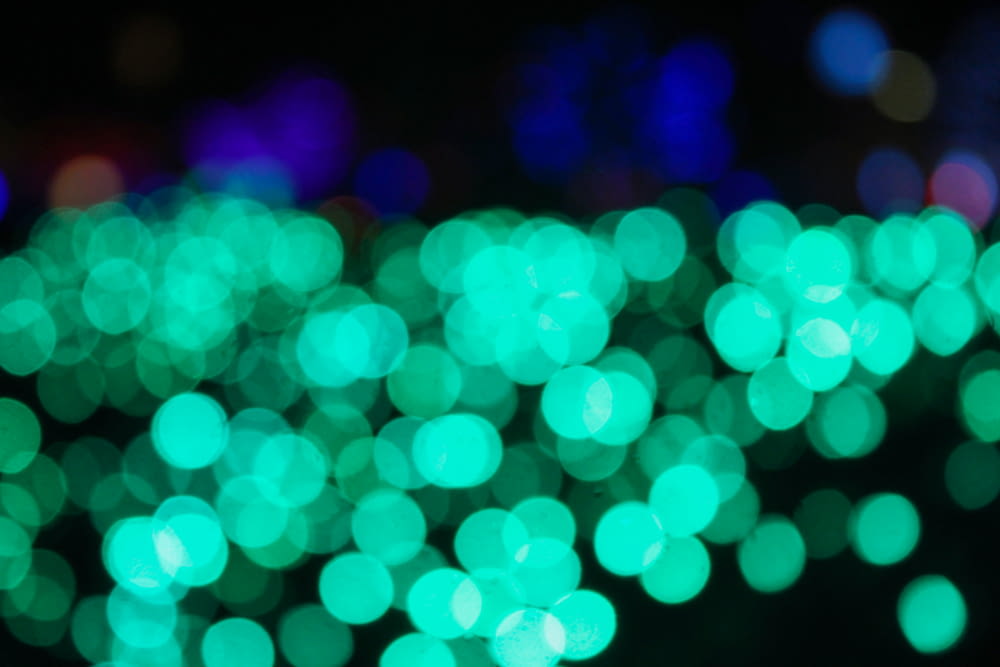 bokeh photography off green and blue lights