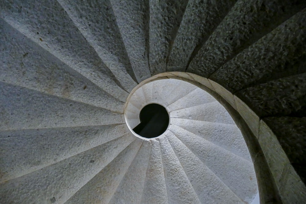 white and grey spiral stairs
