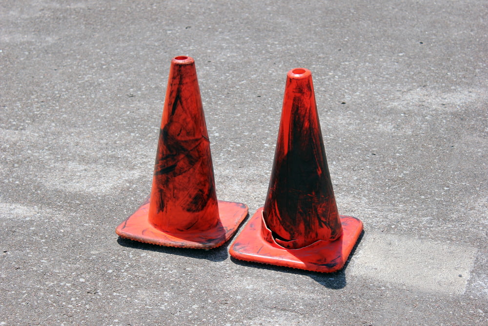 two red traffic cones