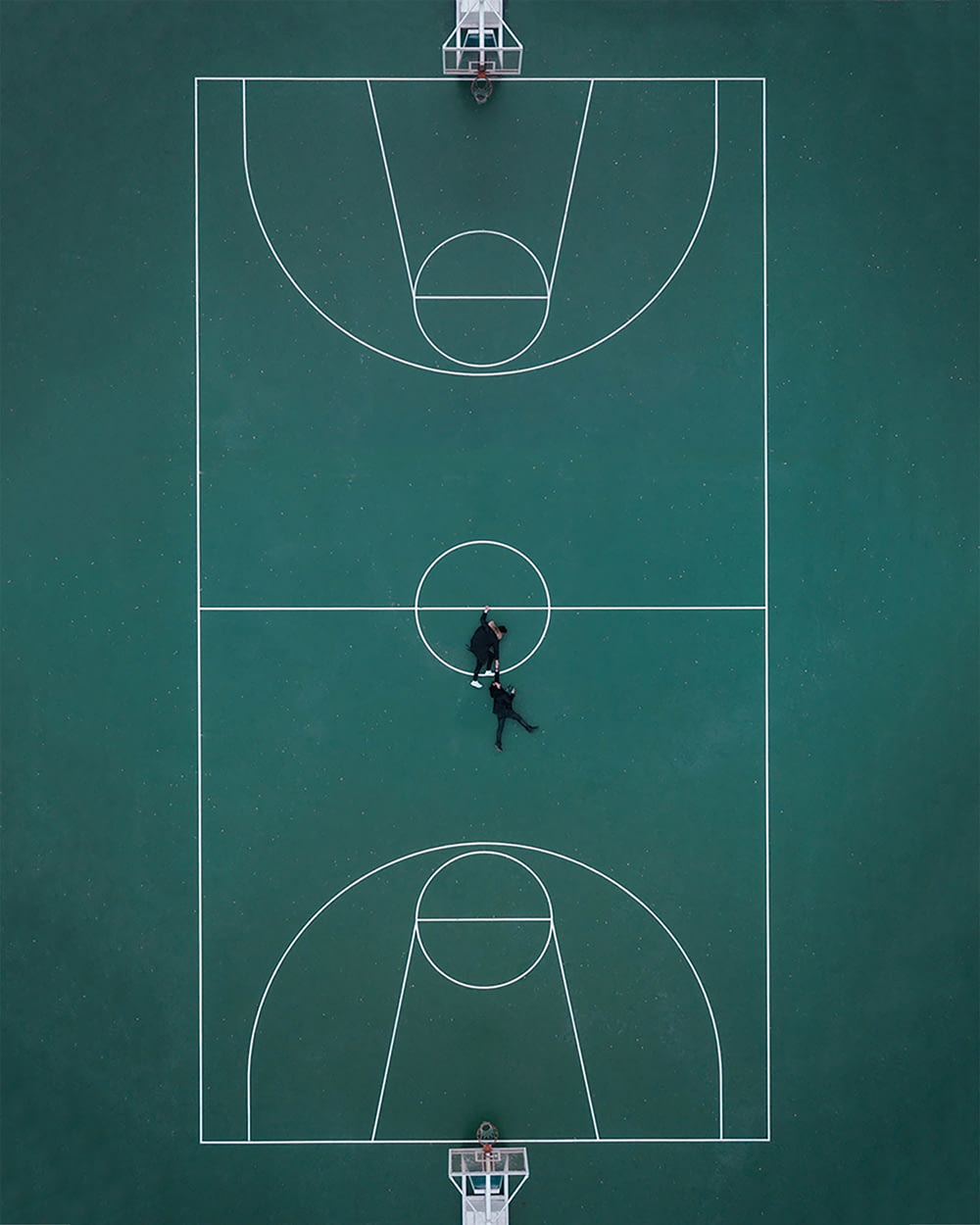 two person in basketball court