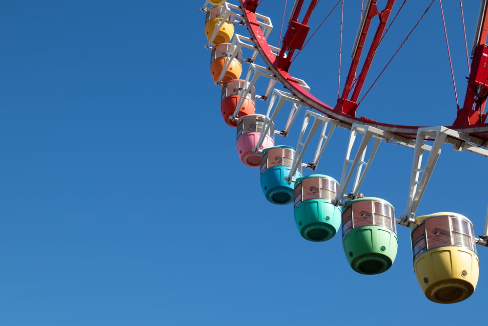 low-angle photography of multicolored Ferris-wheel