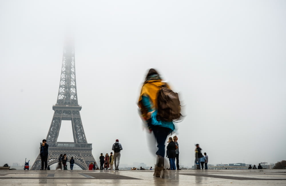 people standing and walking near Eiffel Tower, Paris during day