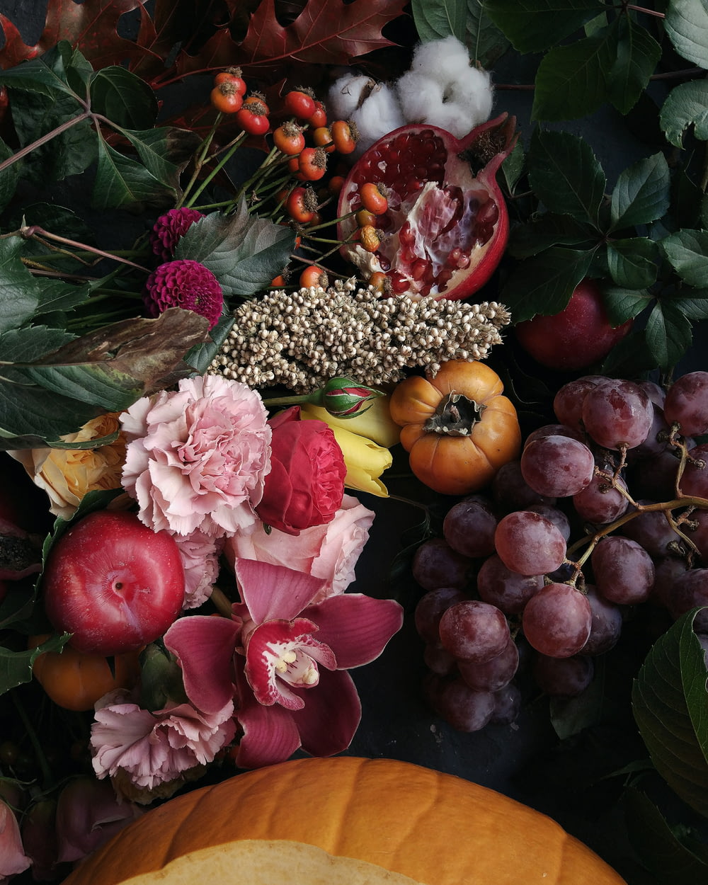 assorted fruits and flowers