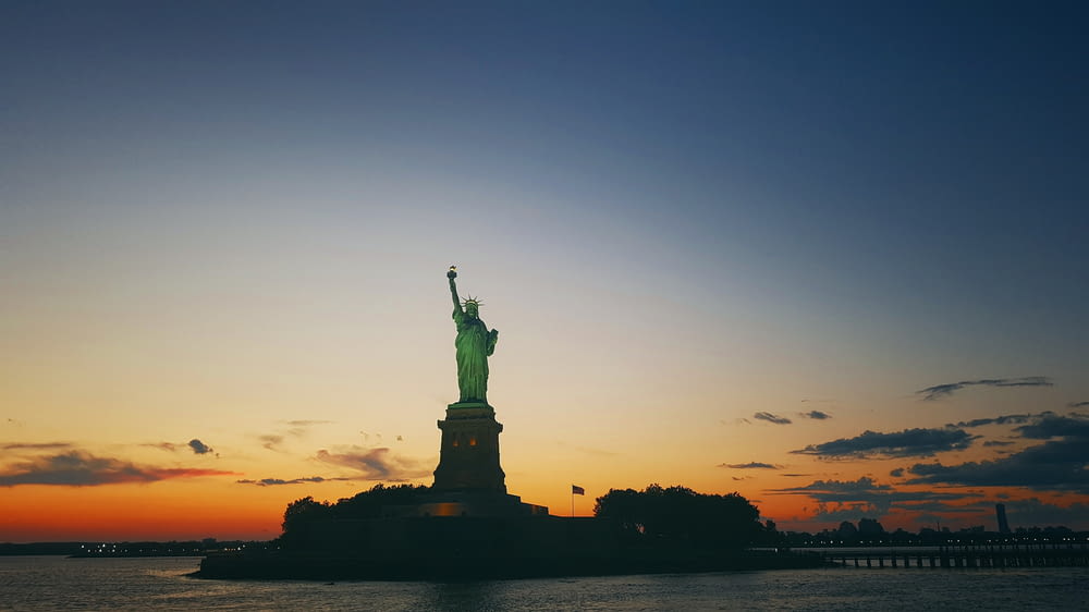 Statue of Liberty under dark sky