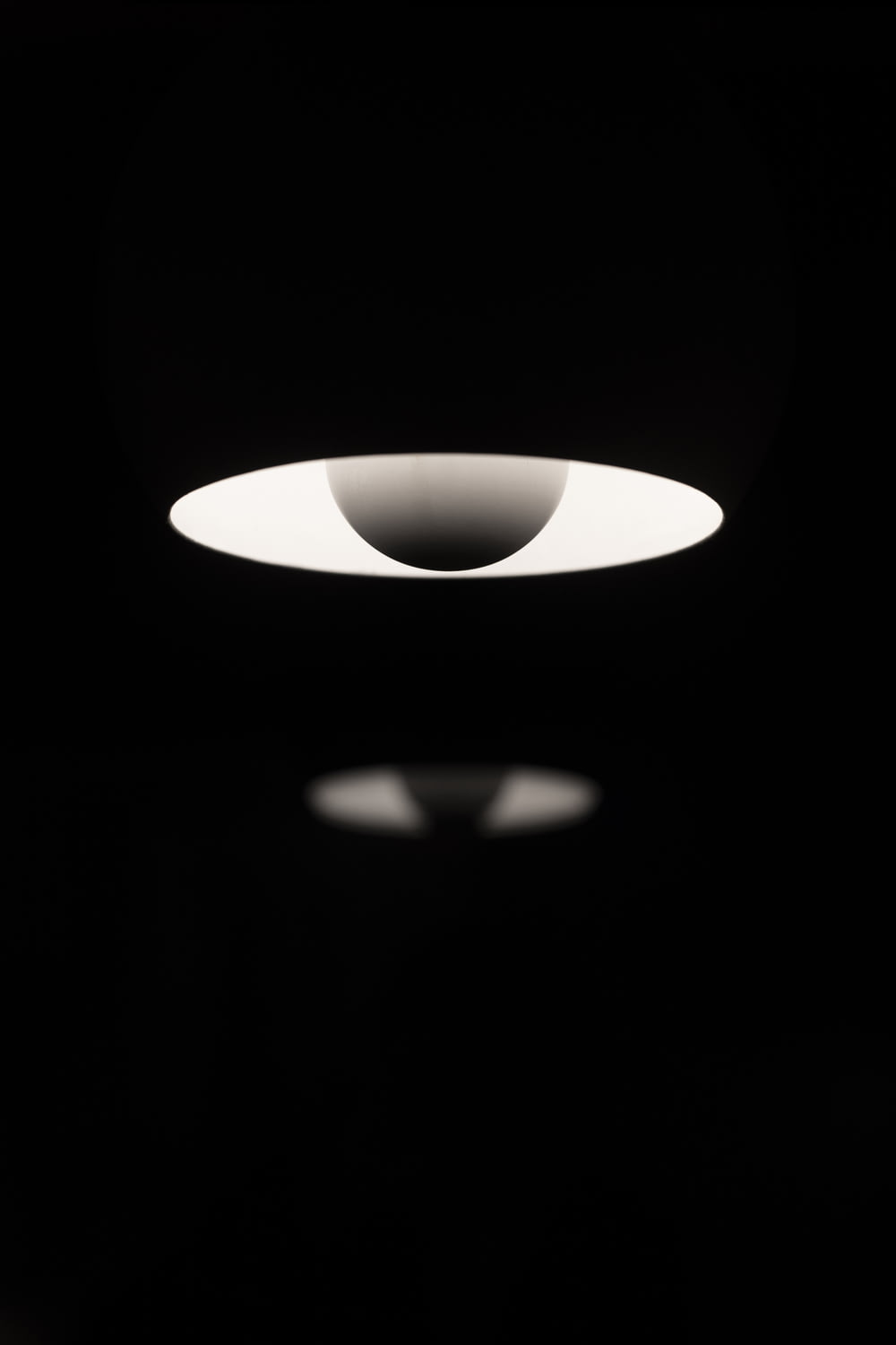 white and black pendant lamp