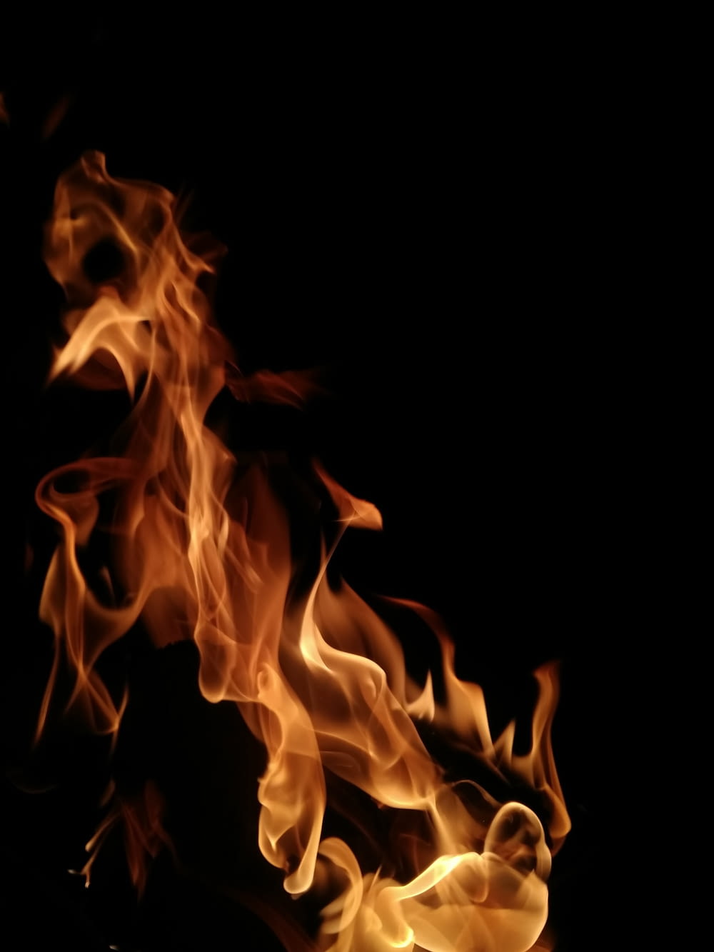 shallow focus photography of fire