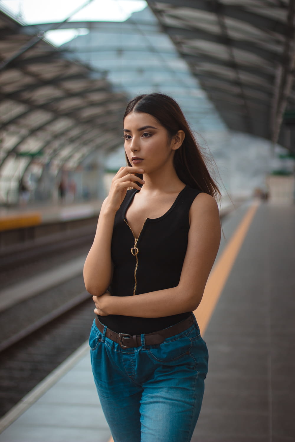 woman standing in train station