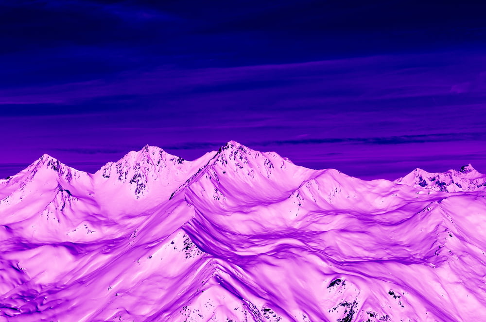 purple mountains under blue sky