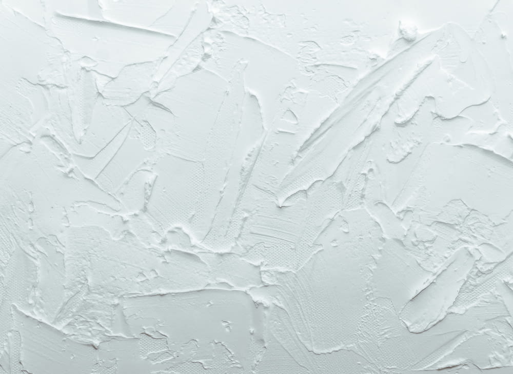 a white wall with some paint on it