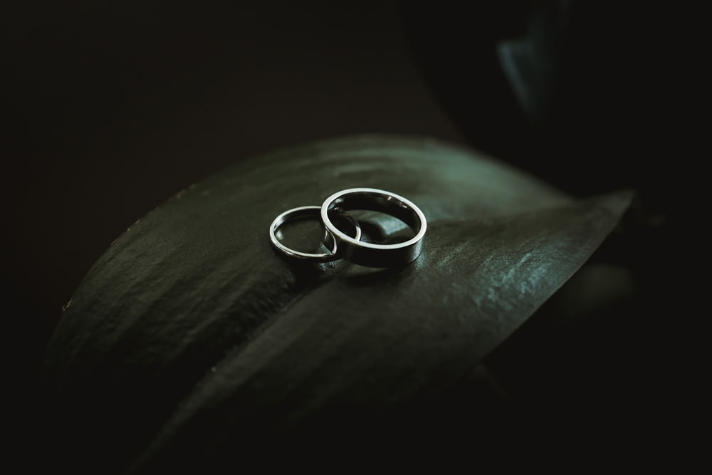silver-colored rings