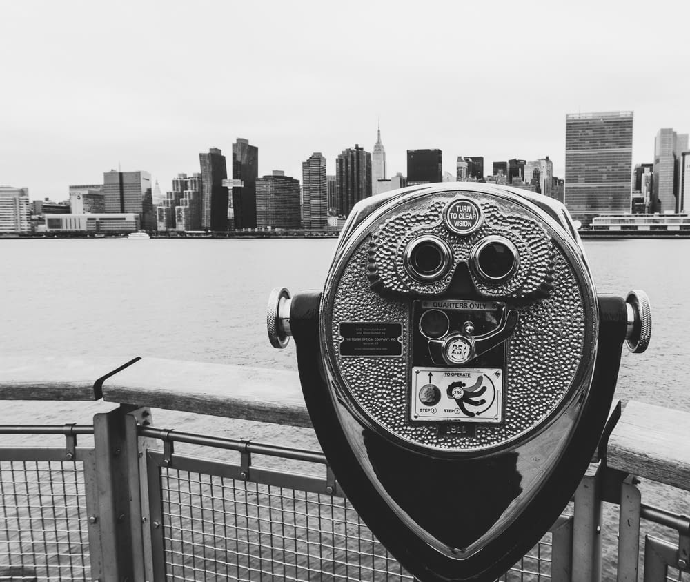binocular coin operated facing skyscraper view