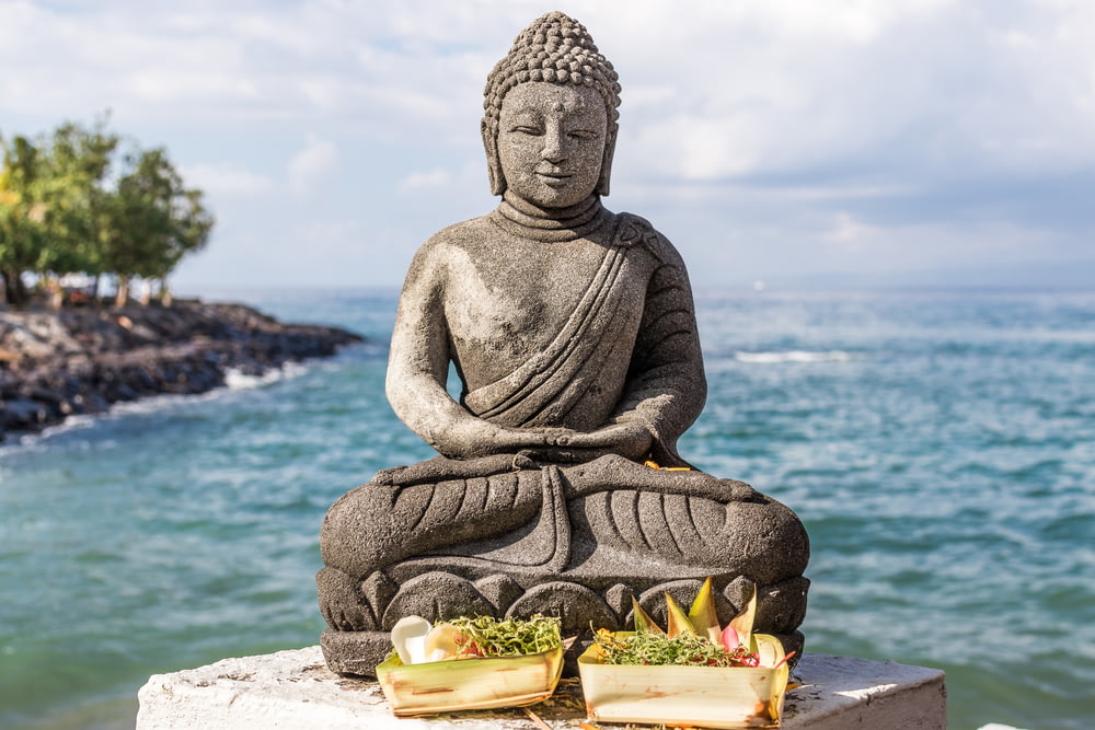 Gautama Buddha with two basket of foods