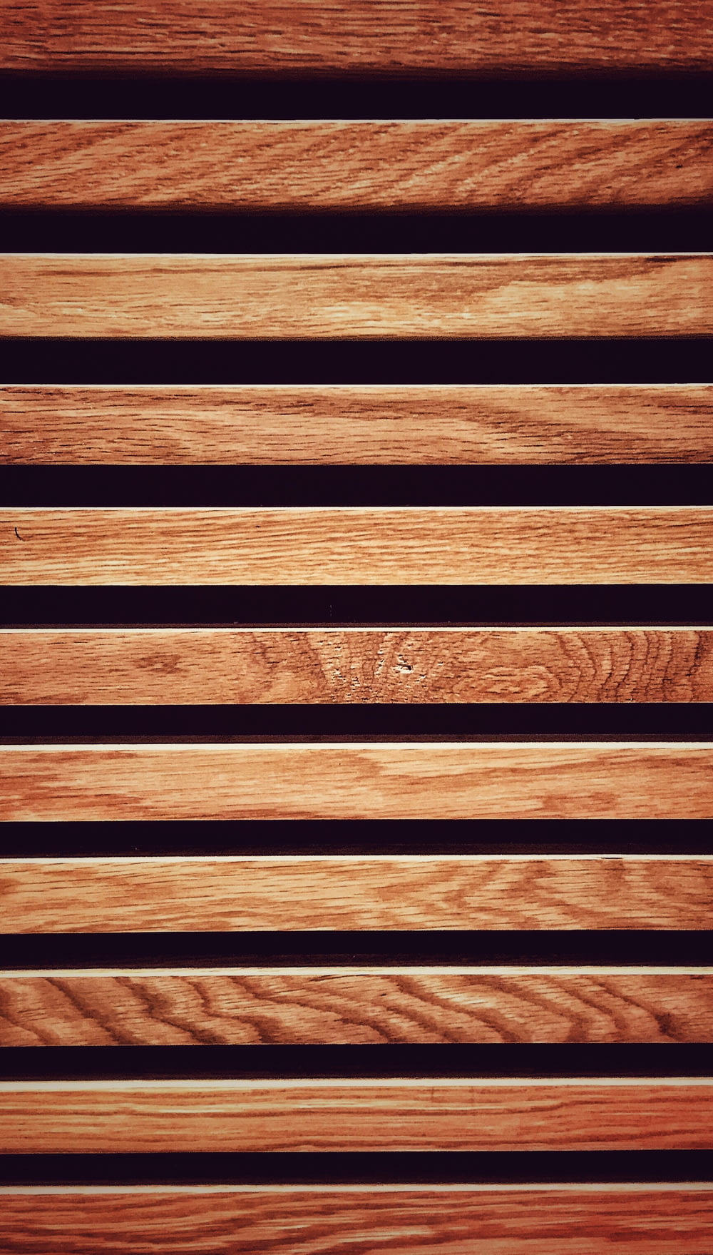 a close up of a wooden slatted surface