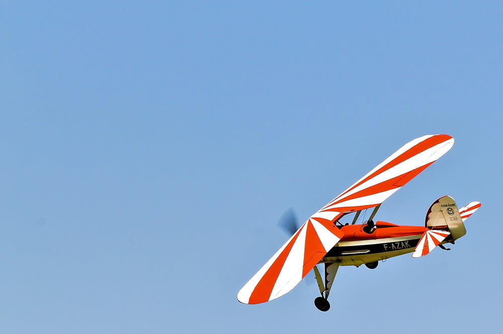 white and red monoplane