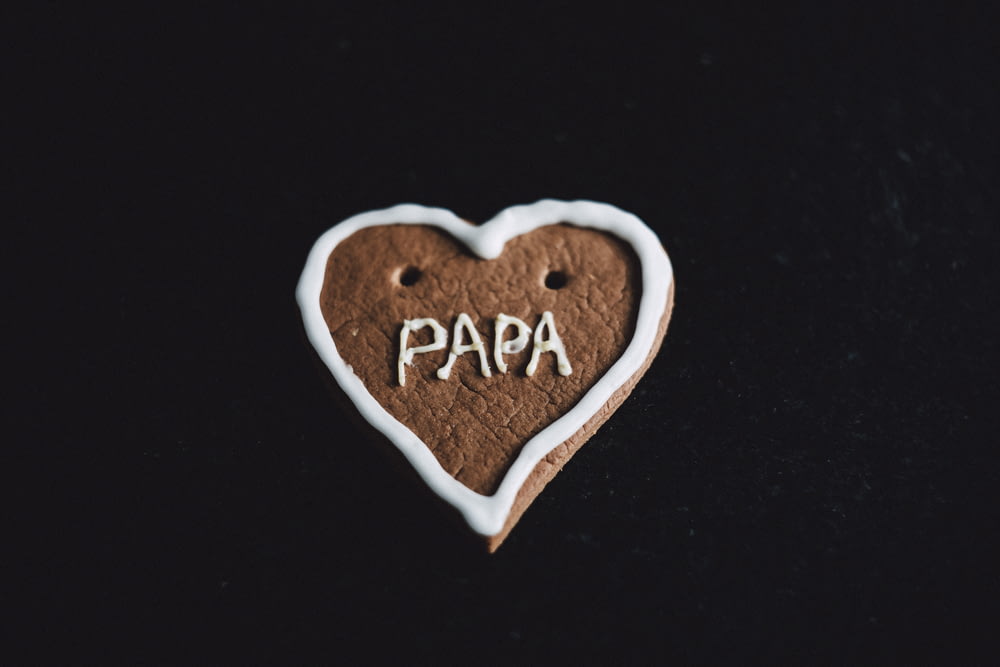 heart-shaped cookie with papa decoration