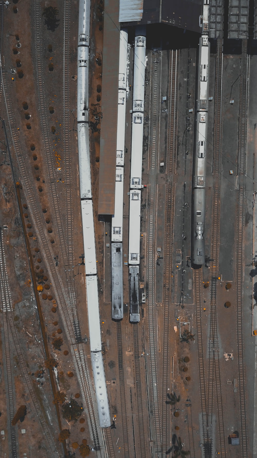 aerial photography of gray trains and train track