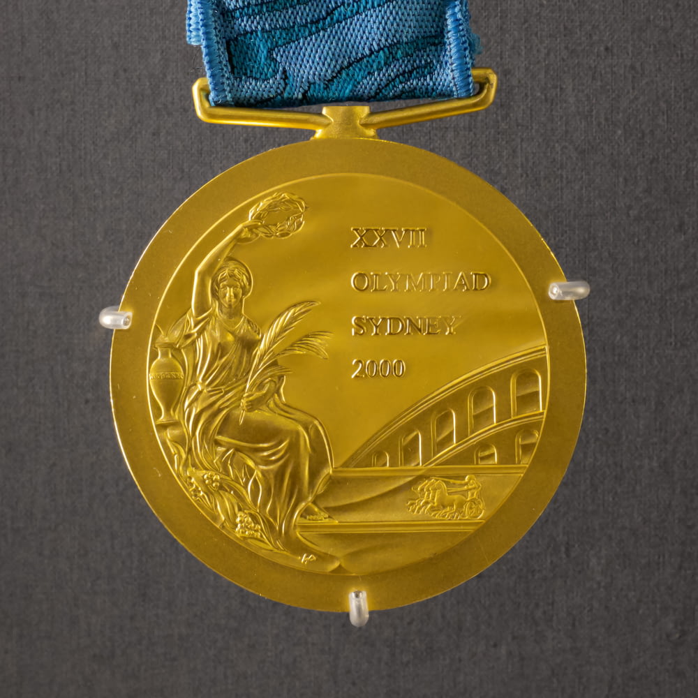 runde goldfarbene Medaille