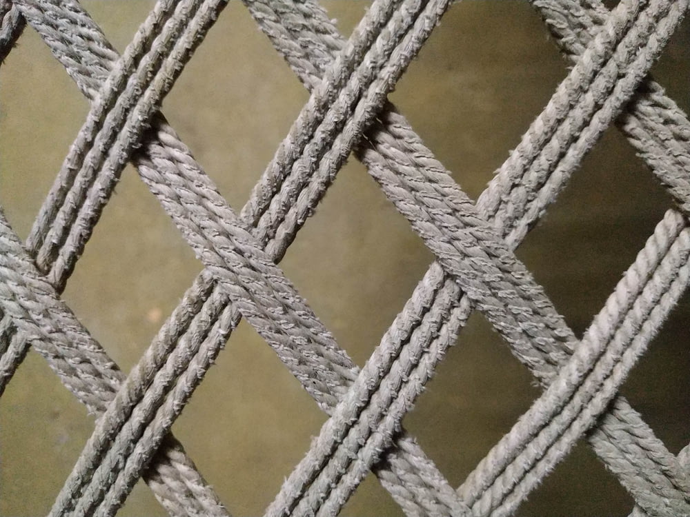 a close up view of a rope fence