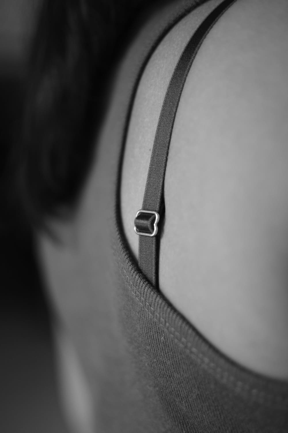 a close up of a person wearing a bra