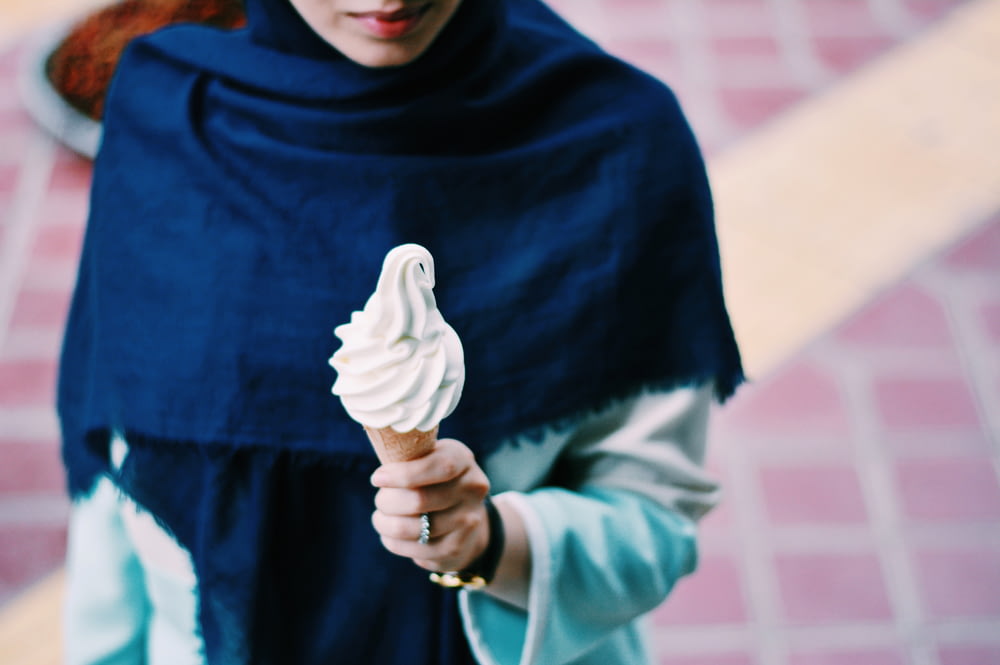 white soft ice cream on a cone