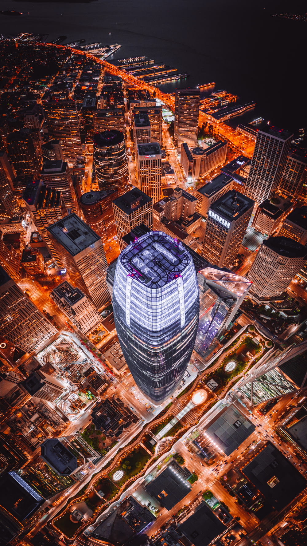 aerial photography of curtain wall high-rise building during night