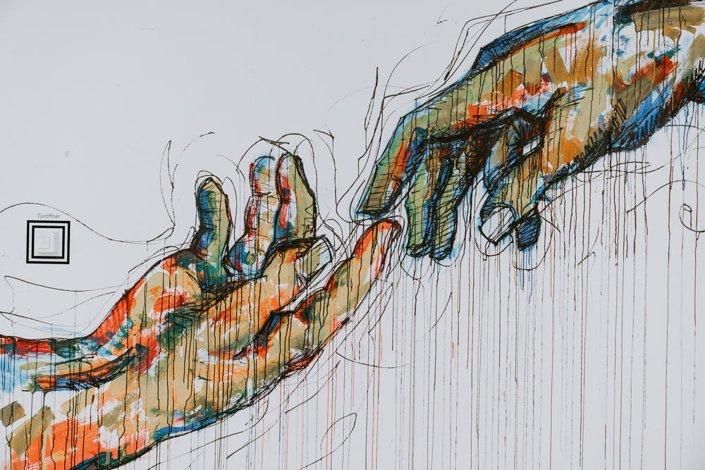 pintura de duas mãos humanas