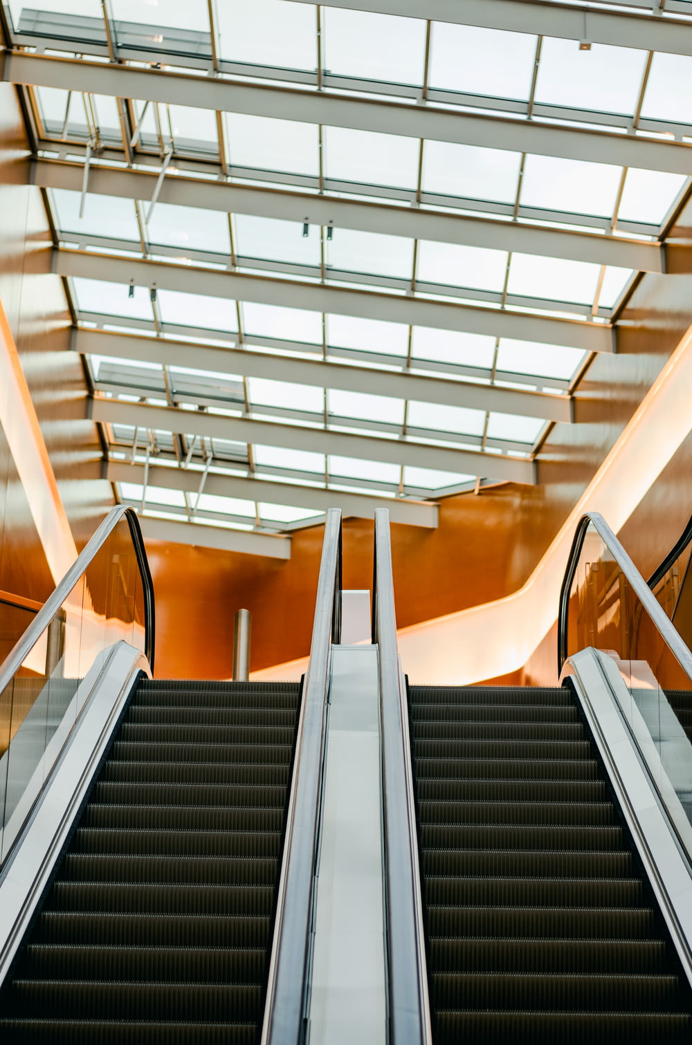 structural photography of escalators