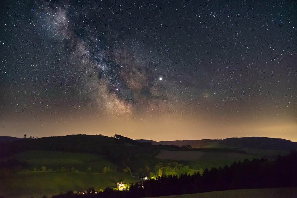 starry night sky over the valley