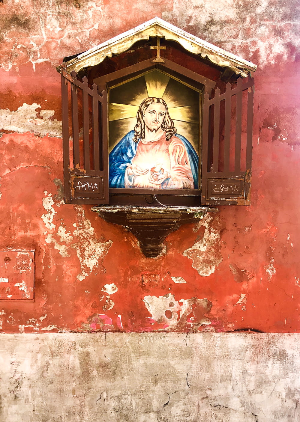 The Sacred Heart of Jesus painting on wall