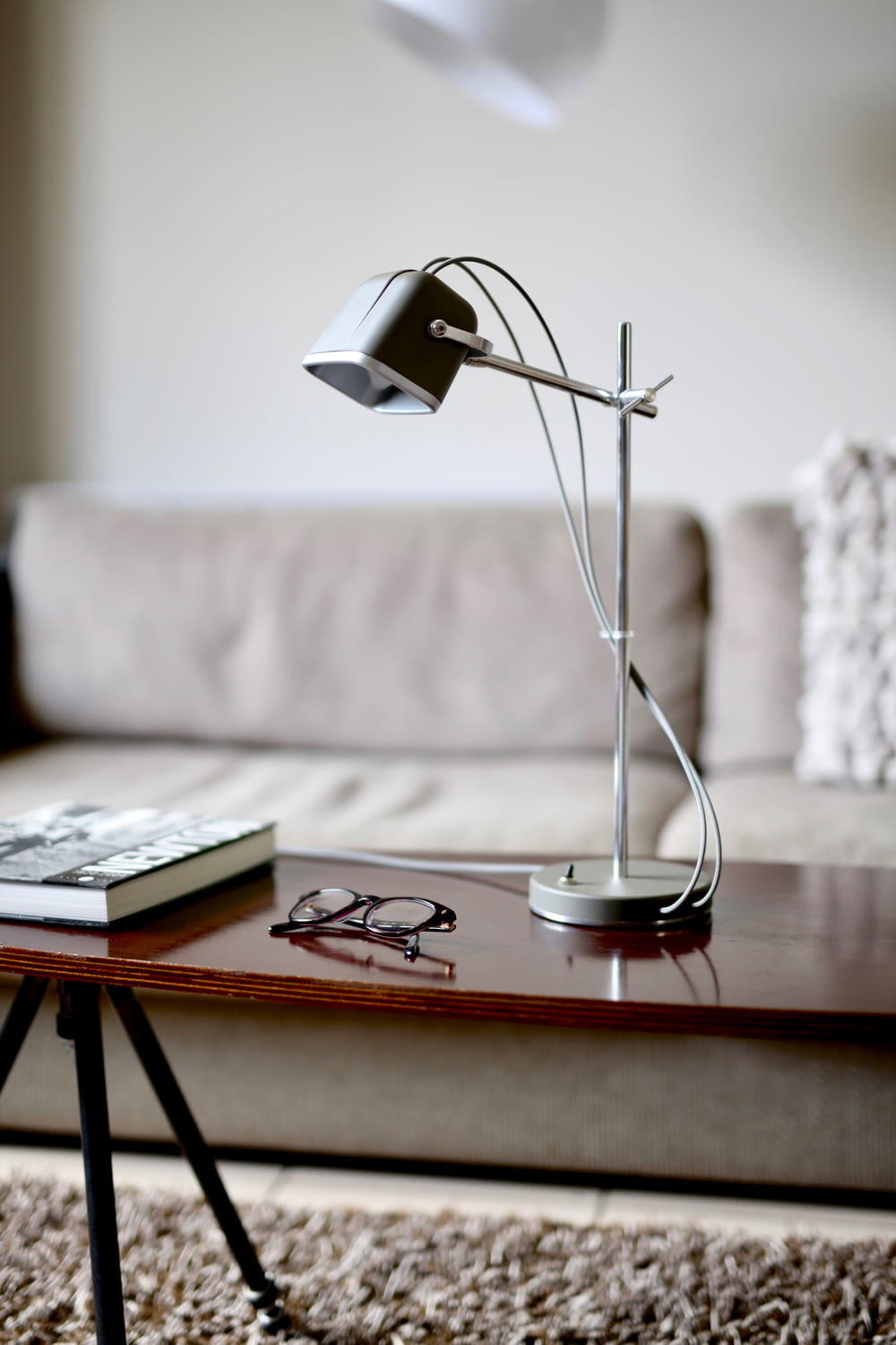 grey study lamp on table