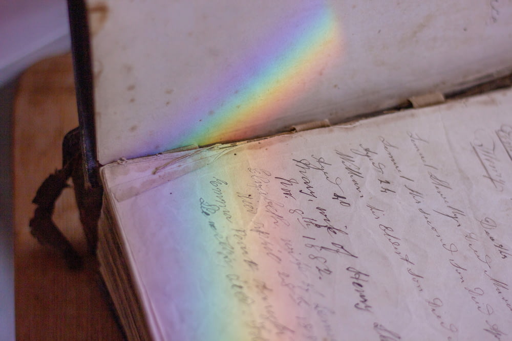 a book with a rainbow in the middle of it