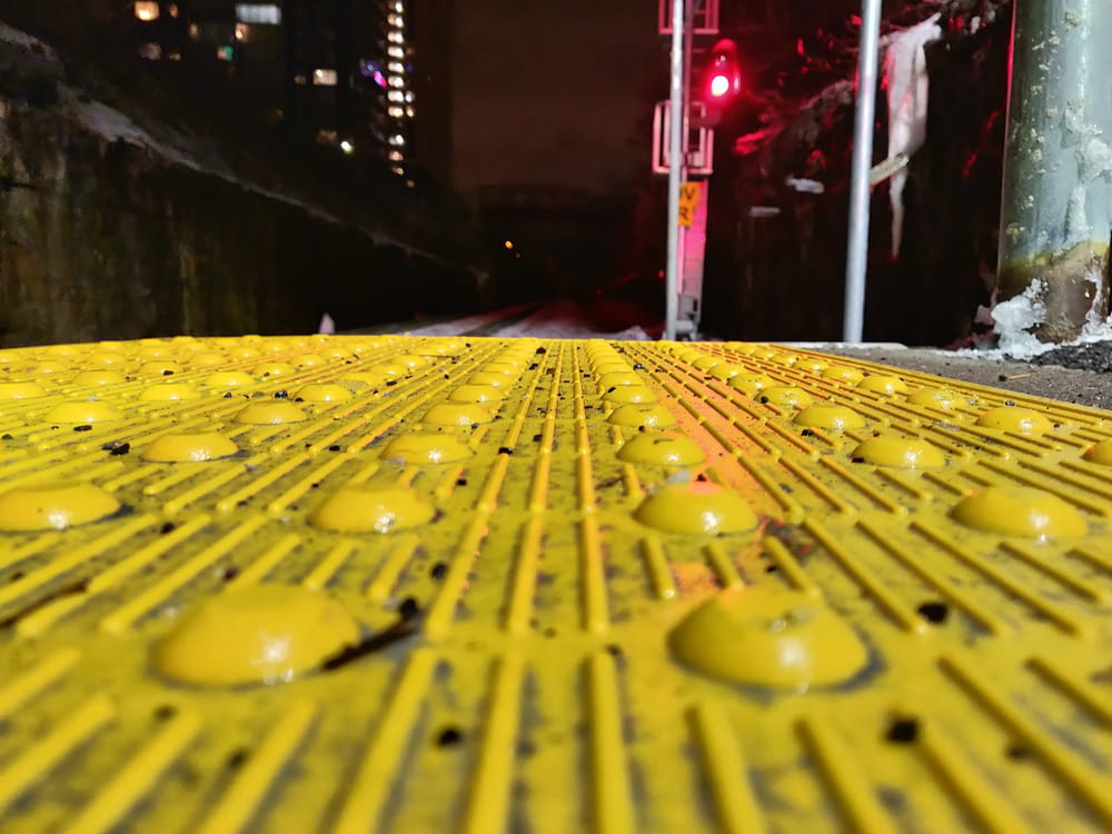 a street with a lot of yellow dots on it