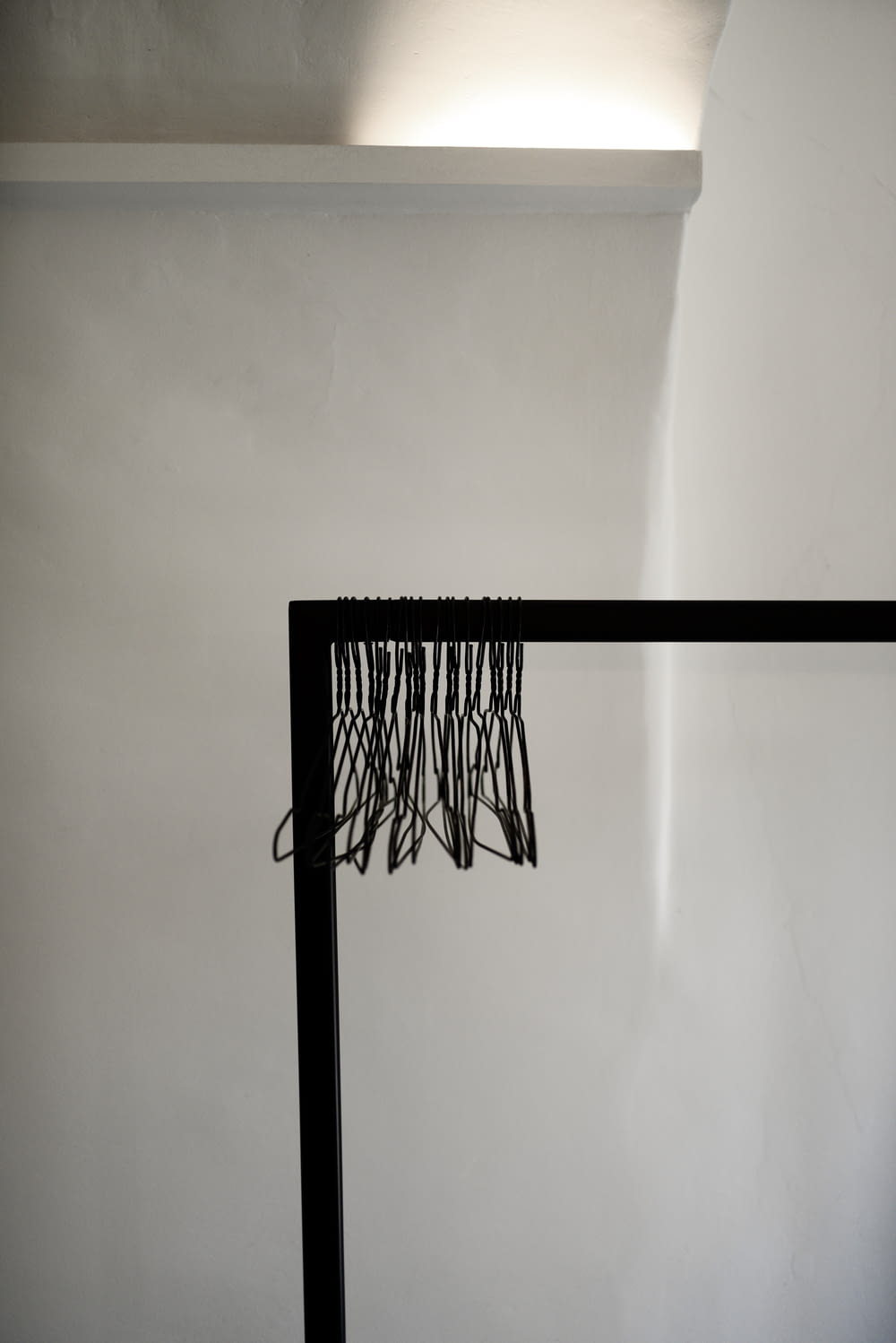 clothes hangers on clothes rack