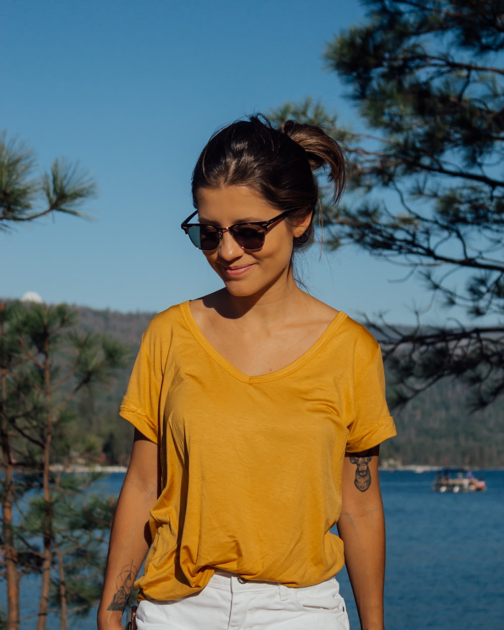 woman wearing yellow v-neck shirt