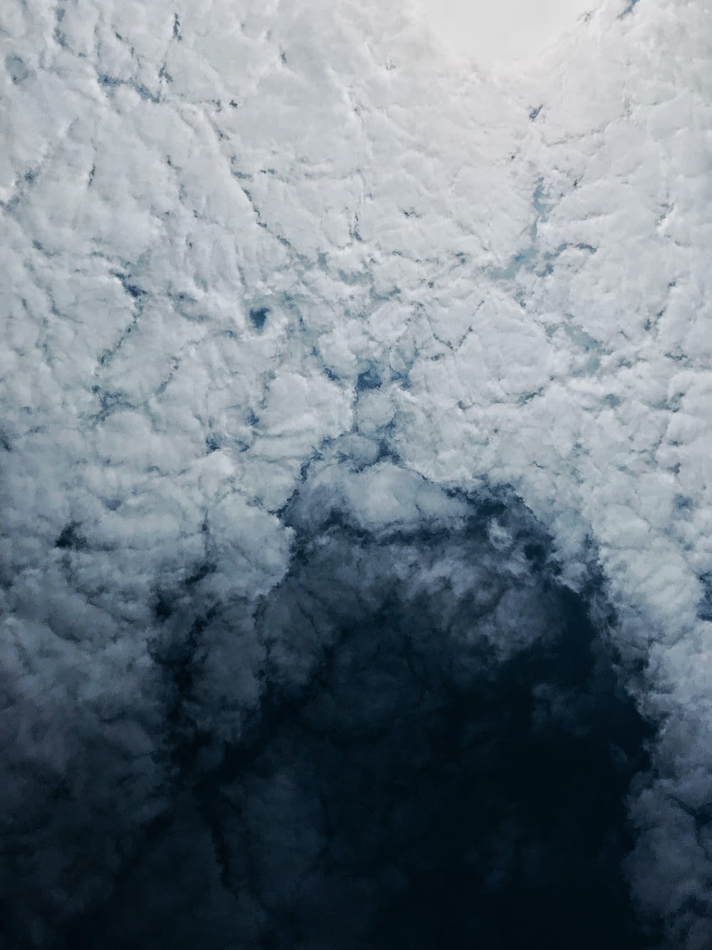 an aerial view of clouds in the sky