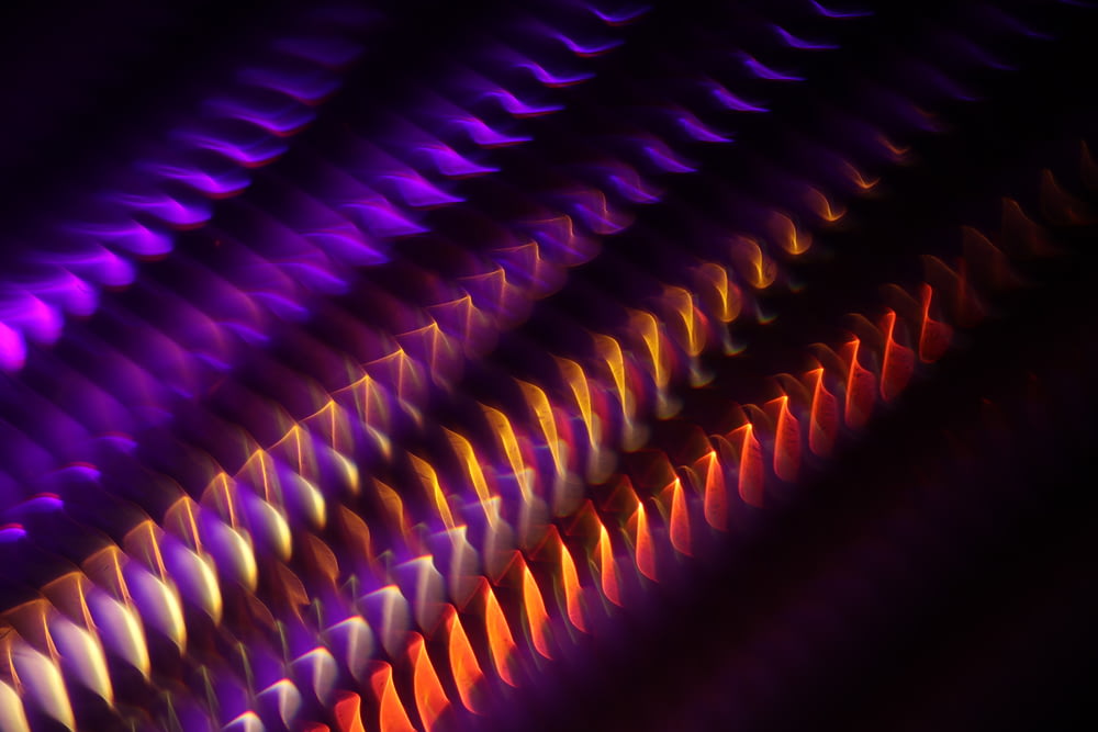 a close up of a pattern of colored lights