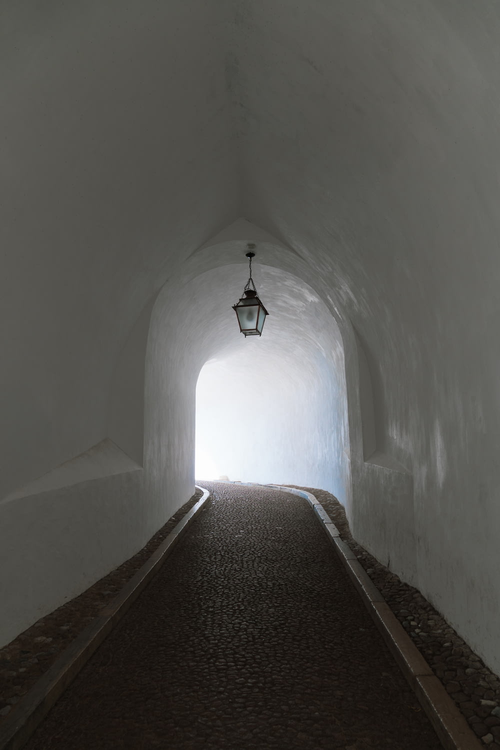 white concrete tunnel