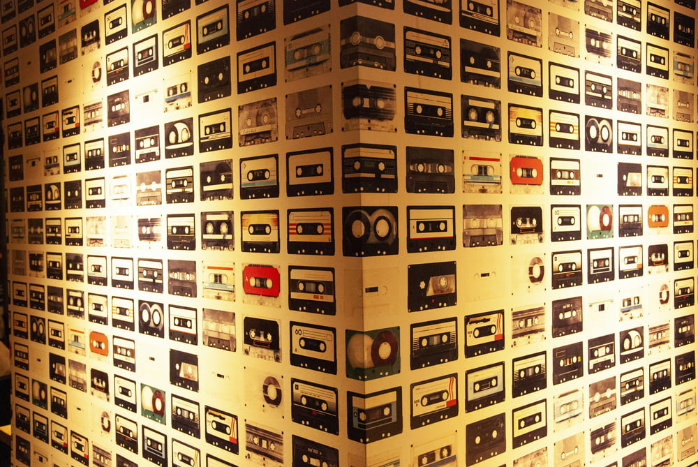 multicolored cassette case graphic wall close-up photography