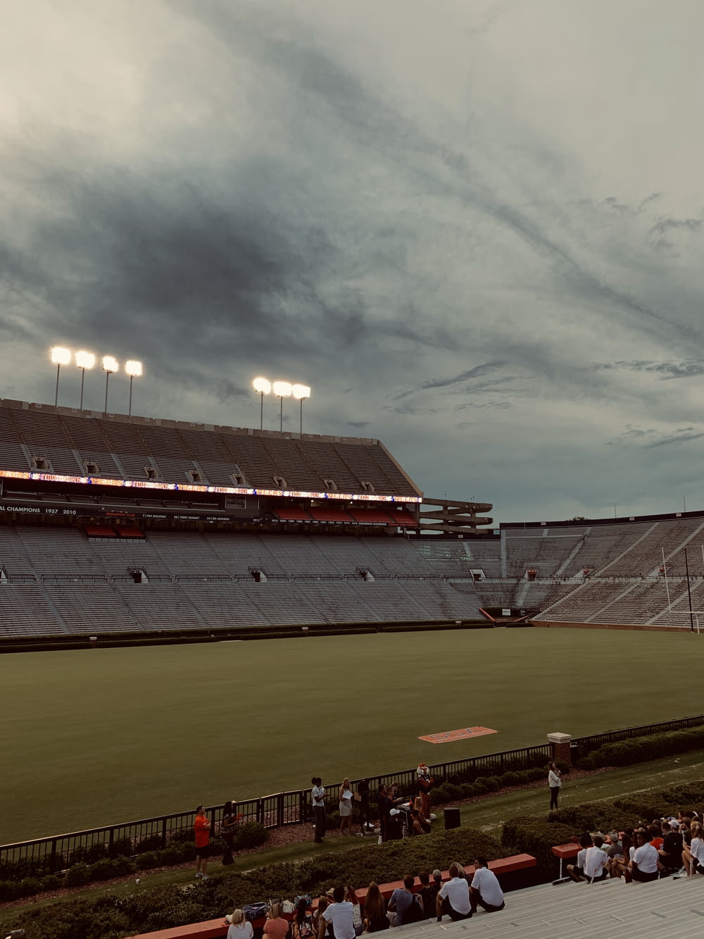 selective photography of game field under gray sky