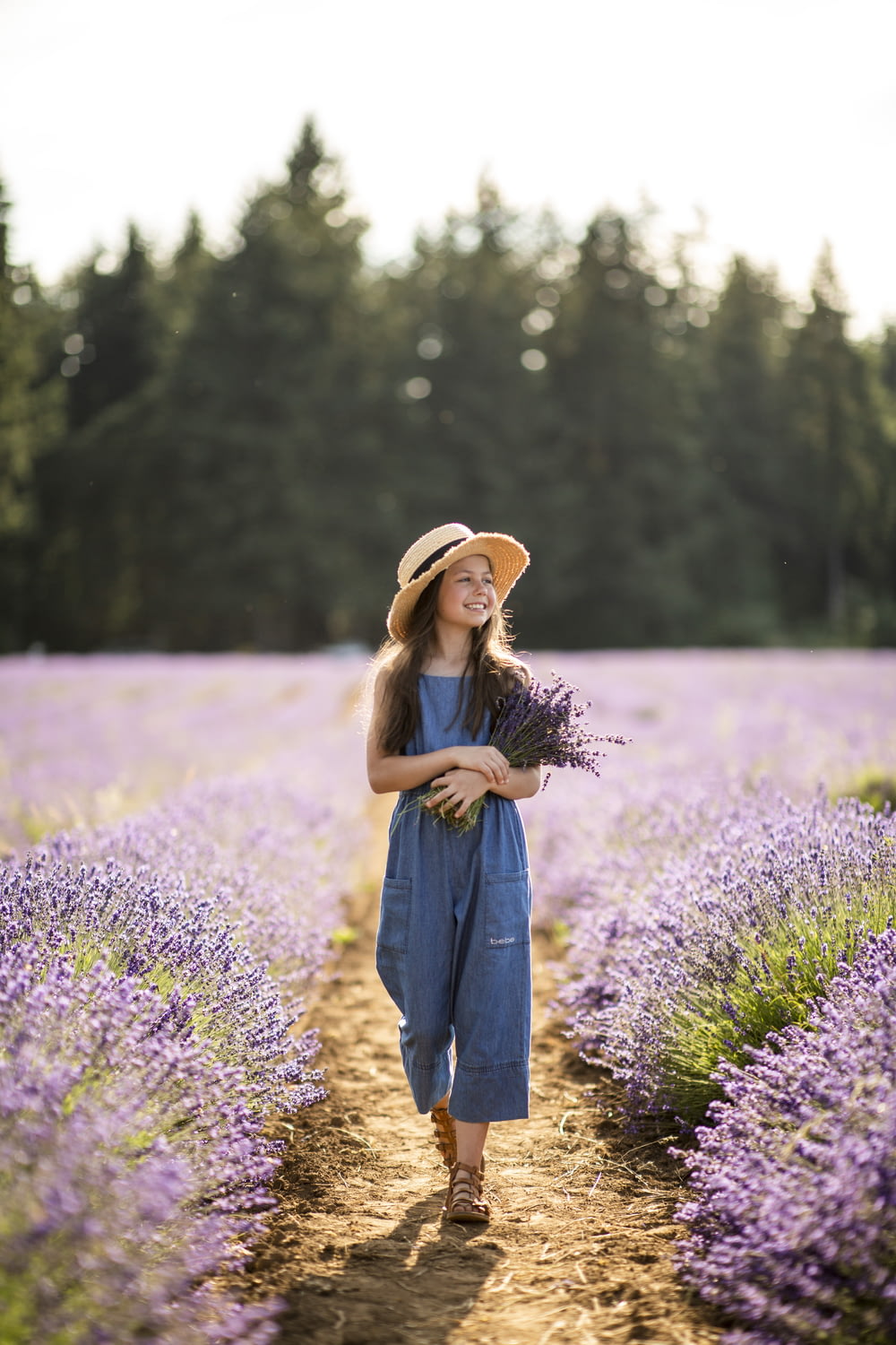 woman standing near lavender flowers