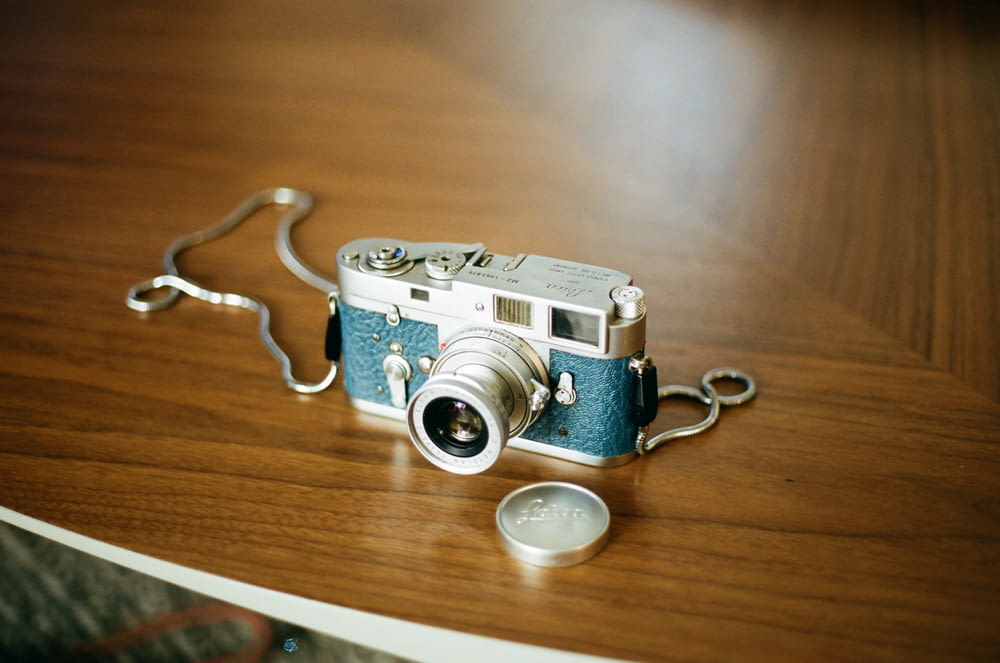 blue and gray camera close-up photography