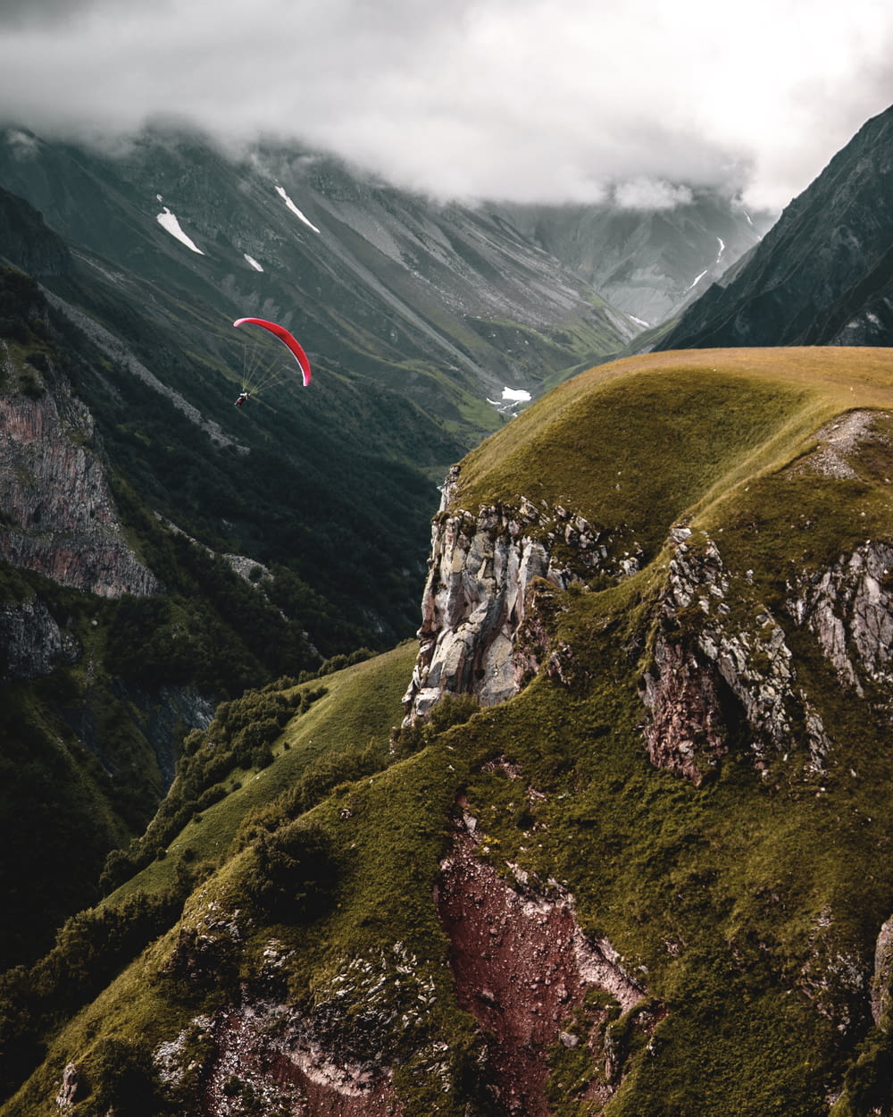 person paragliding during daytime