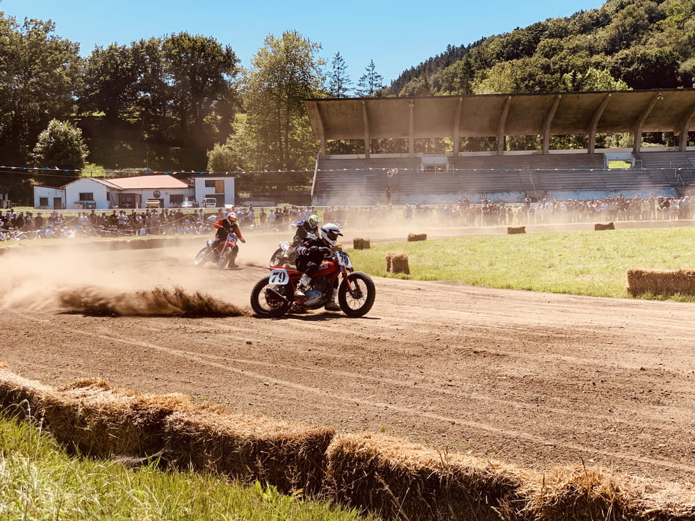 person riding on dirt bike during daytime