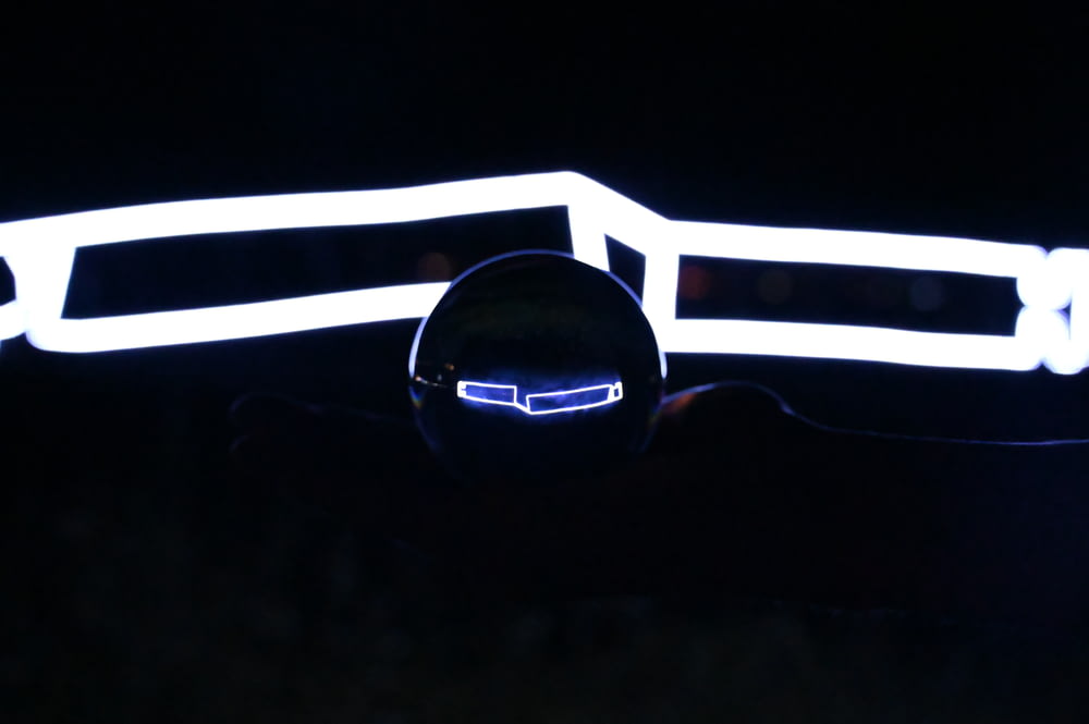a pair of glasses that are glowing in the dark