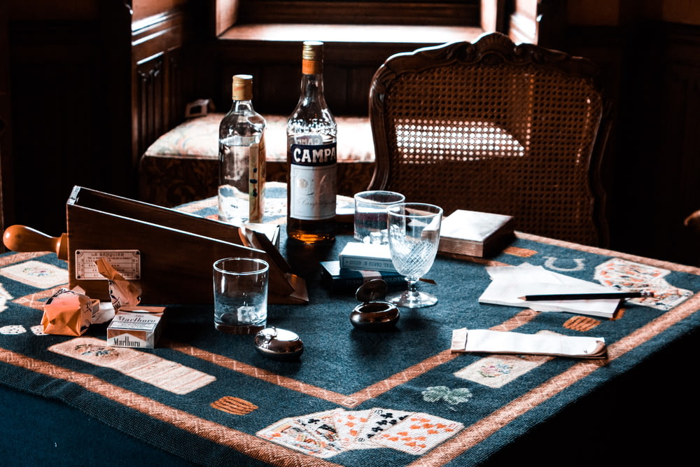 liquor glasses on game table
