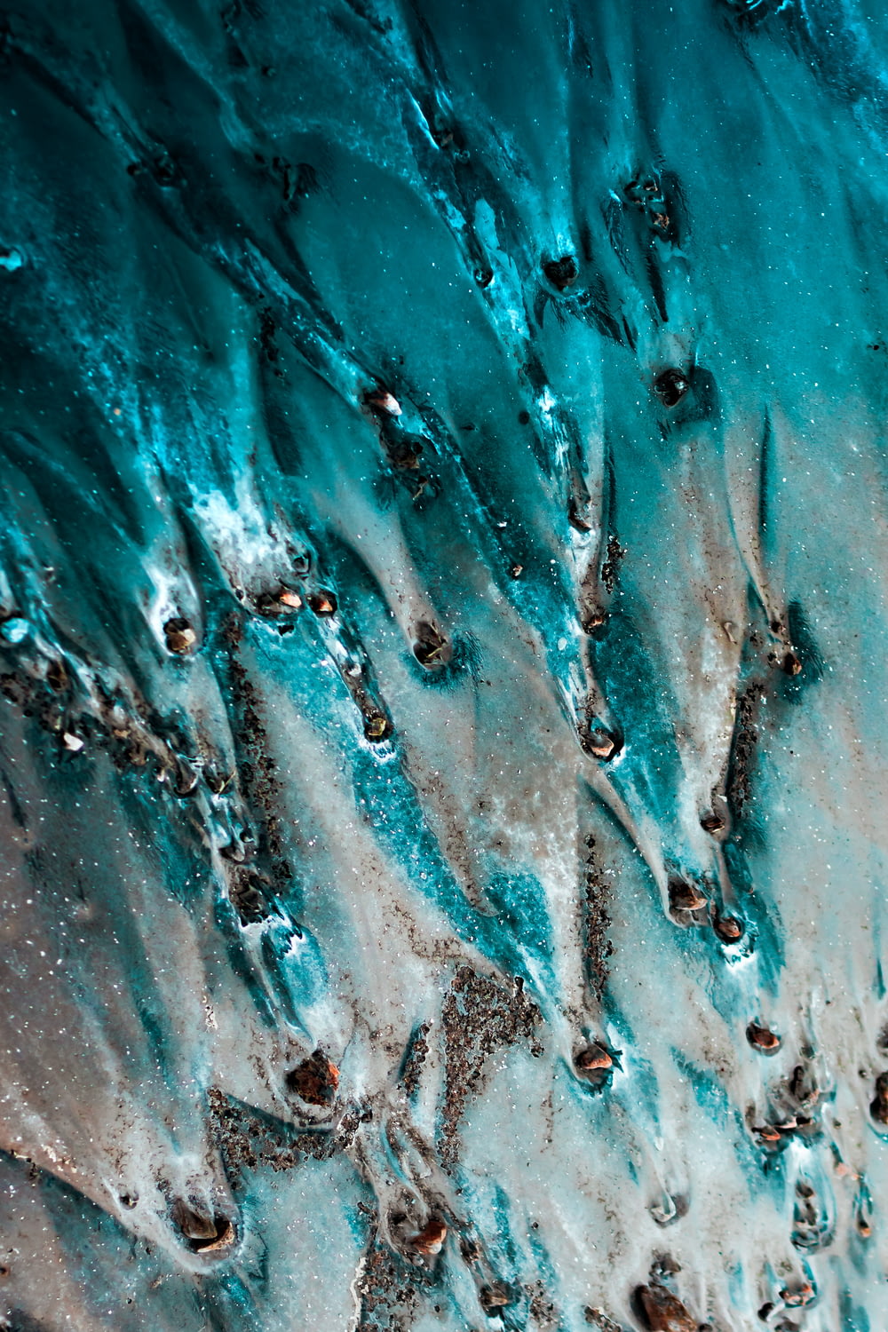 a close up view of water and sand